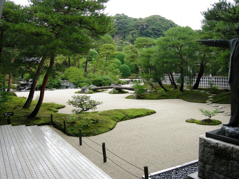 Japanese Zen garden with statue