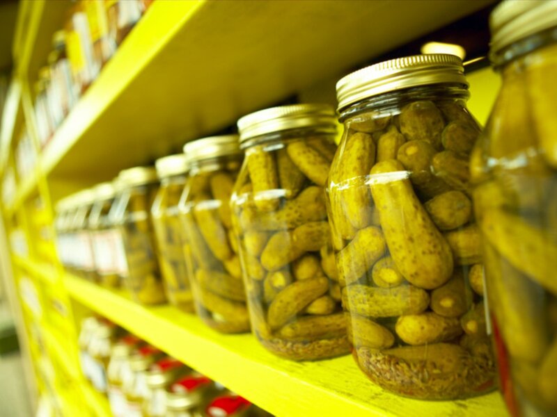 Jars of pickles on shelves