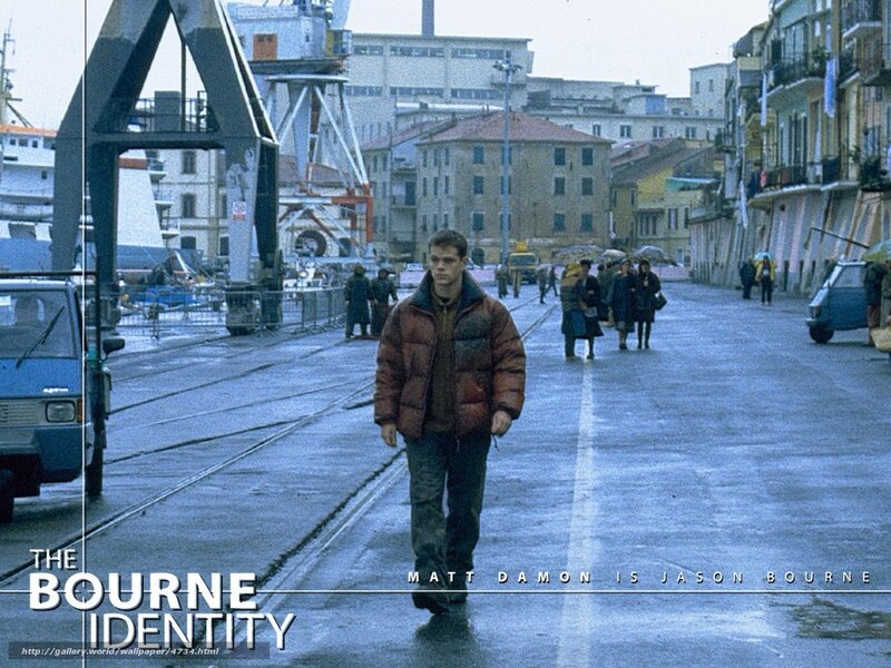 Jason Bourne walking in port