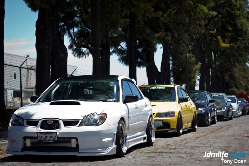 JDM cars lined up on a street