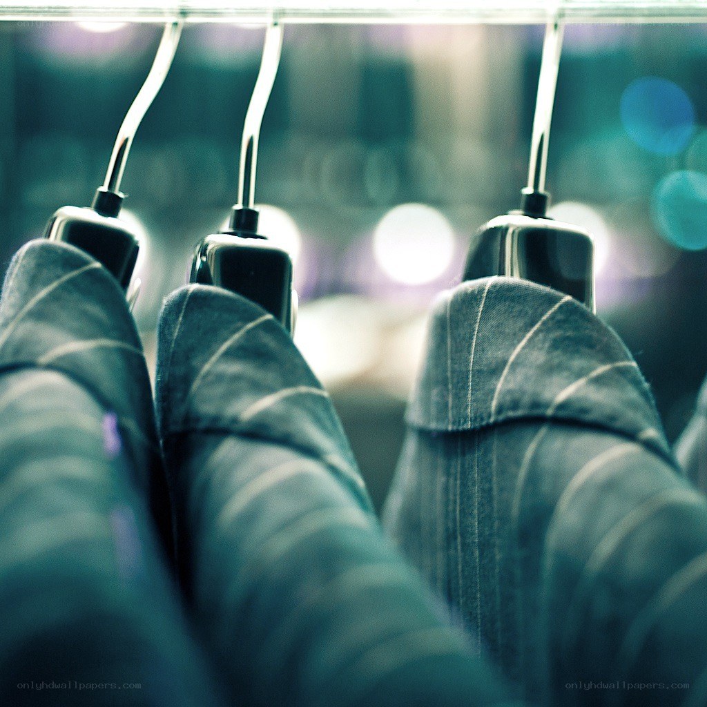 jeans on hangers in store