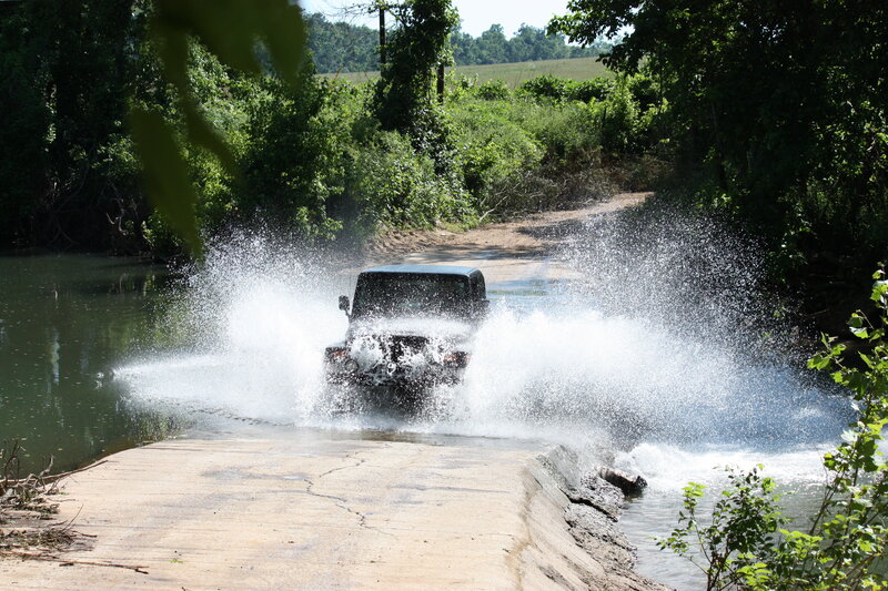 Jeep crossing a river