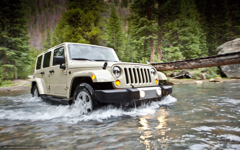 Jeep driving through a river