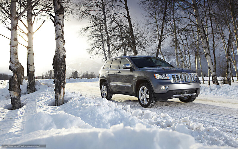 Jeep Grand Cherokee in snowy landscape