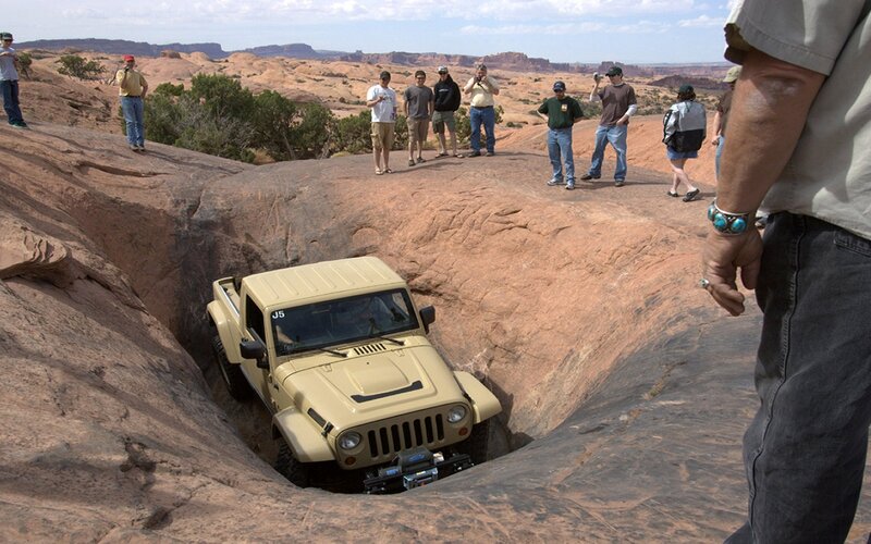 Jeep in Rock Formation