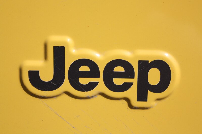 Jeep Logo on Yellow Surface