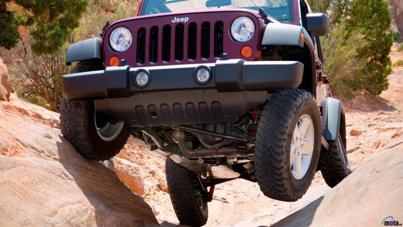 Jeep navigating rocky terrain
