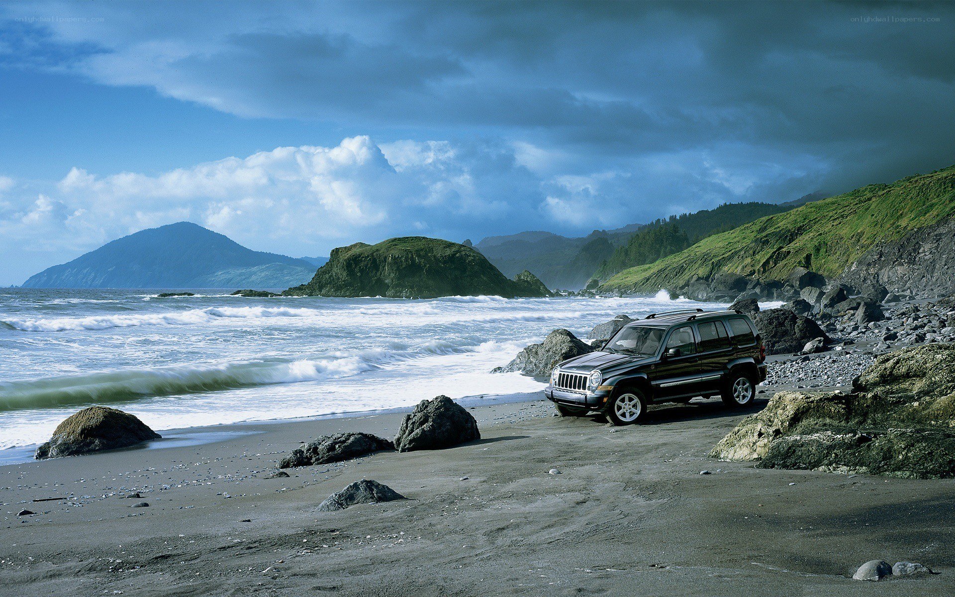 Jeep on a rocky beach