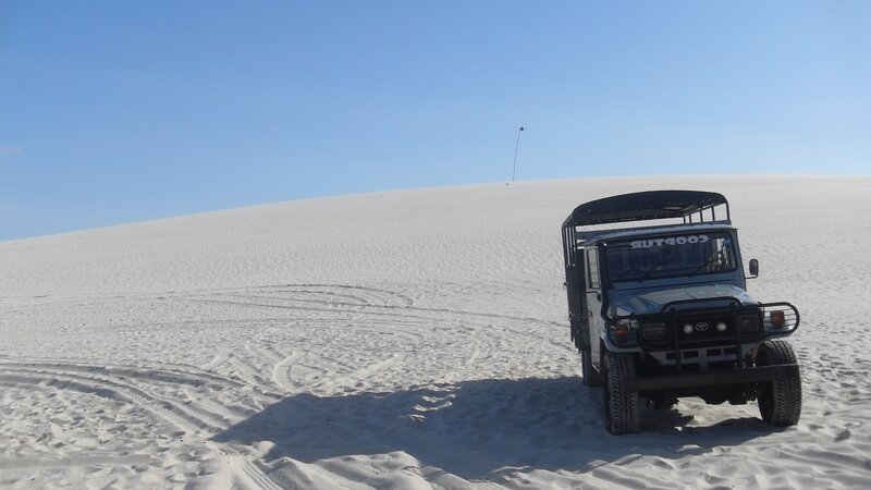 Jeep on a sand dune