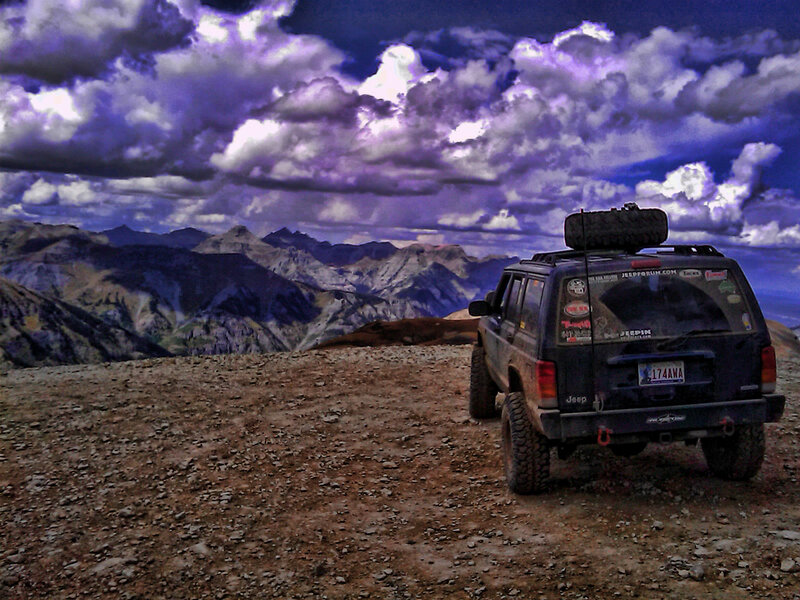 Jeep on Mountain Peak
