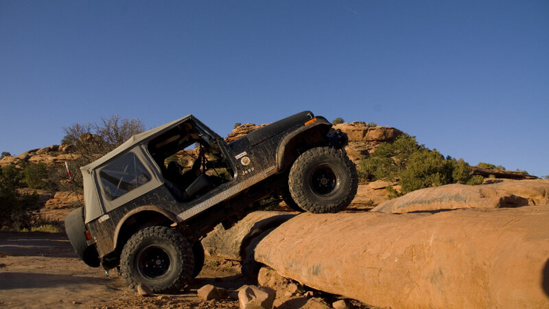 Jeep on Rocky Terrain — Blue