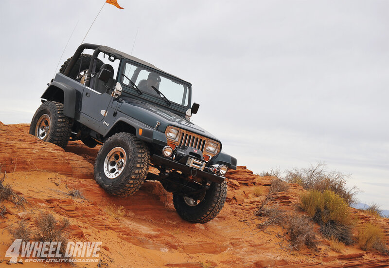 Jeep on Rocky Terrain — Orange