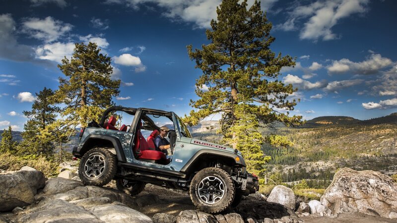 Jeep Rubicon on Rocks — Blue