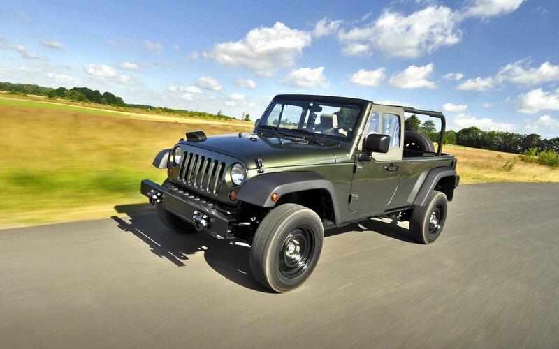 Jeep Wrangler driving on road