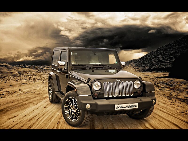 Jeep Wrangler in desert landscape