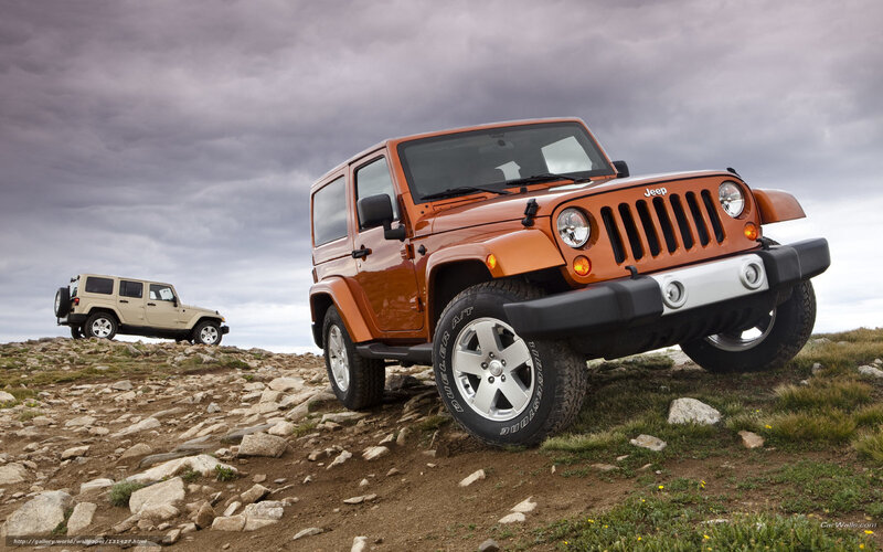 Jeep Wranglers on a rocky hill