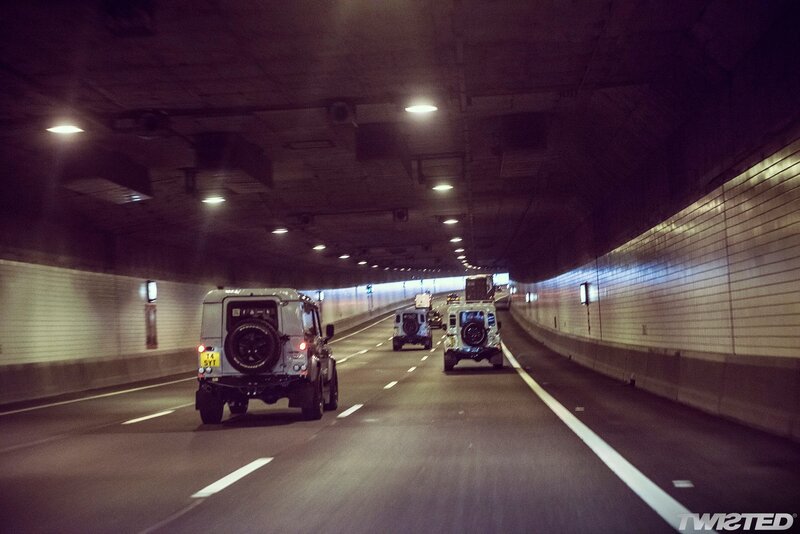 Jeeps driving through a tunnel