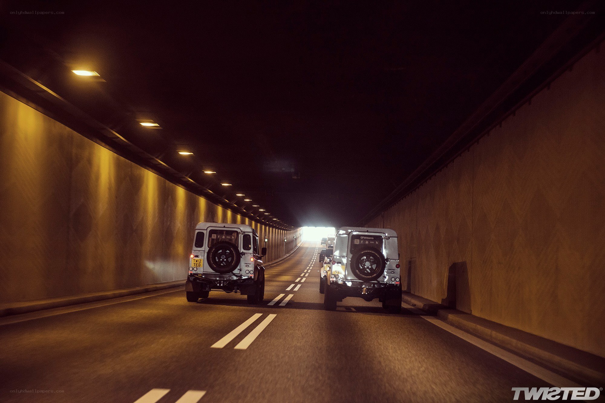 Jeeps in a tunnel