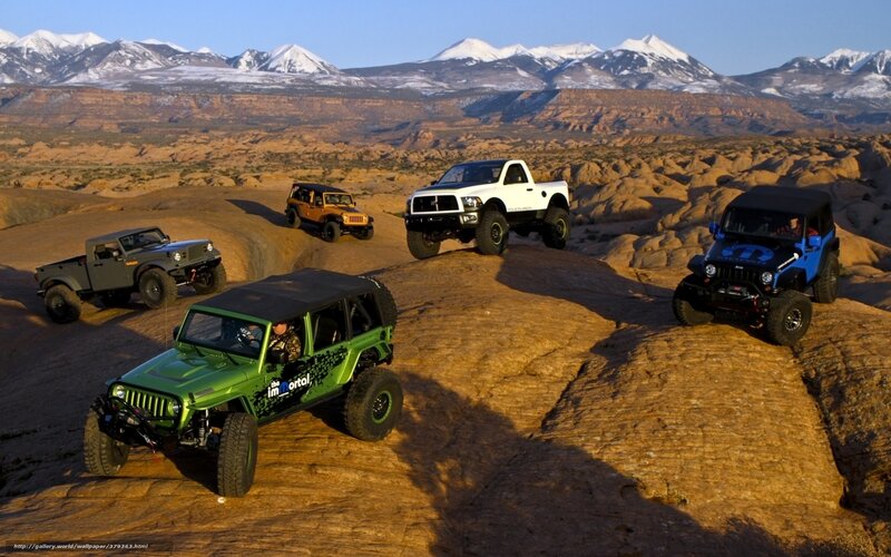Jeeps in desert landscape