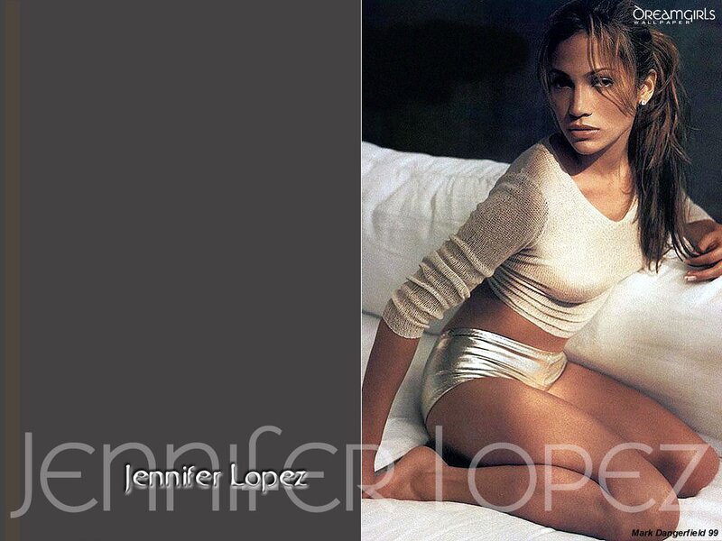 Jennifer Lopez on a bed
