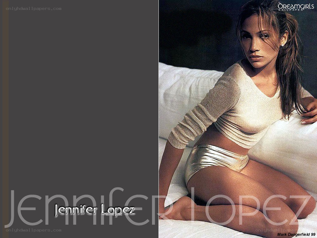 Jennifer Lopez on a bed