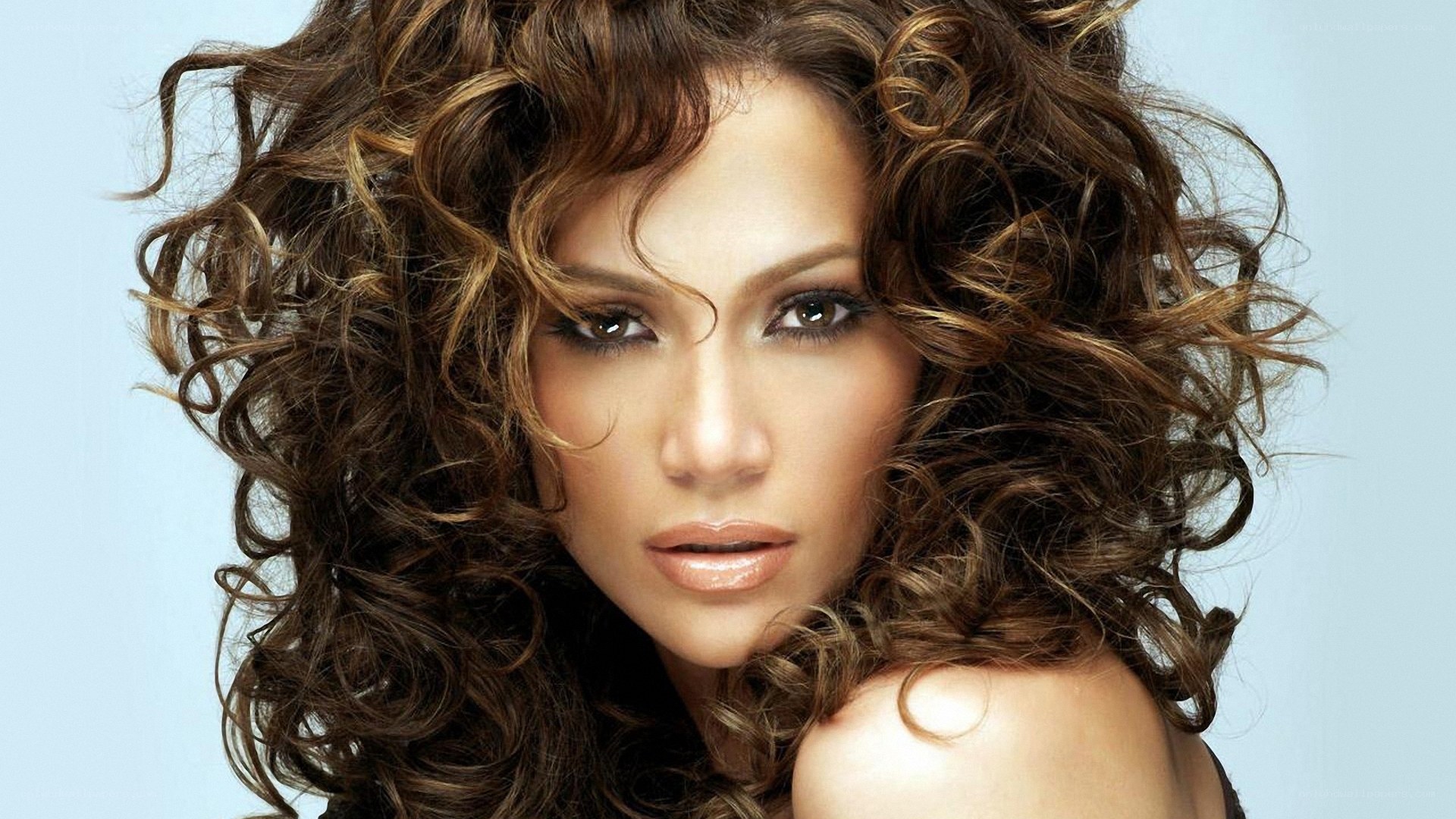 Jennifer Lopez with curly hair