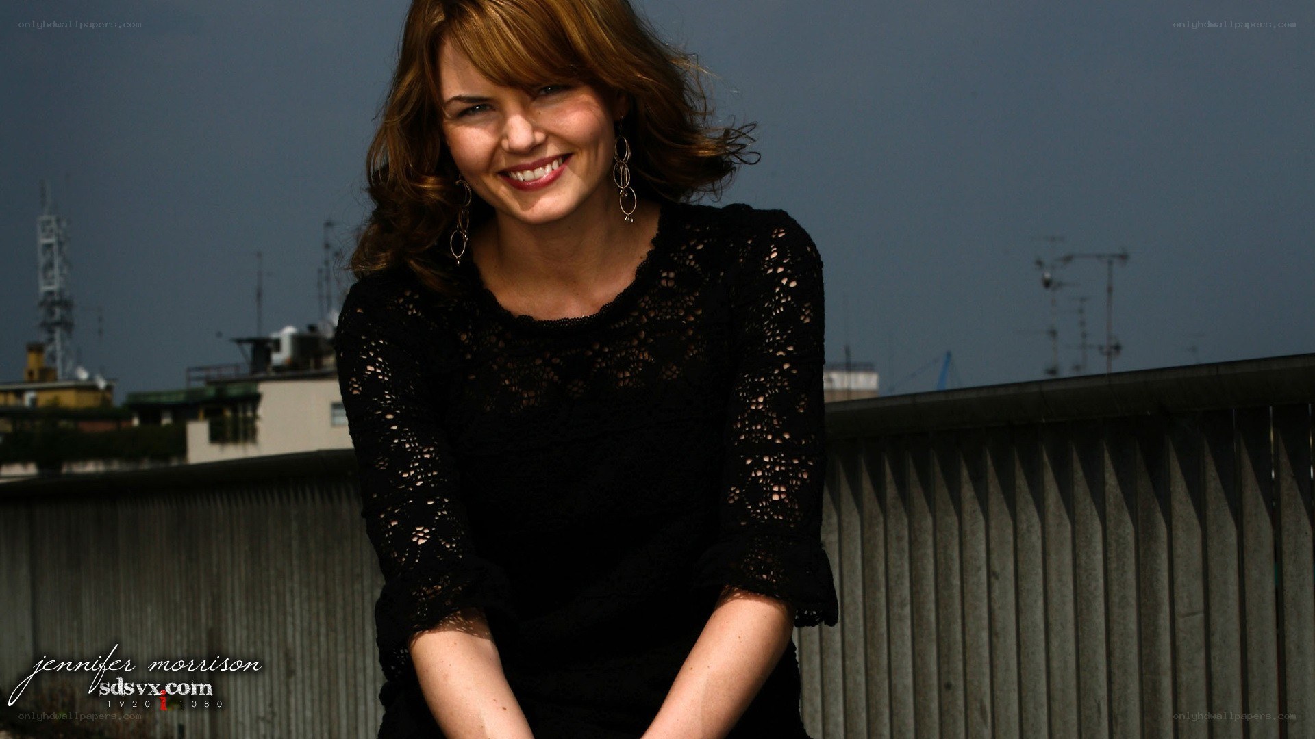 Jennifer Morrison smiling outdoors
