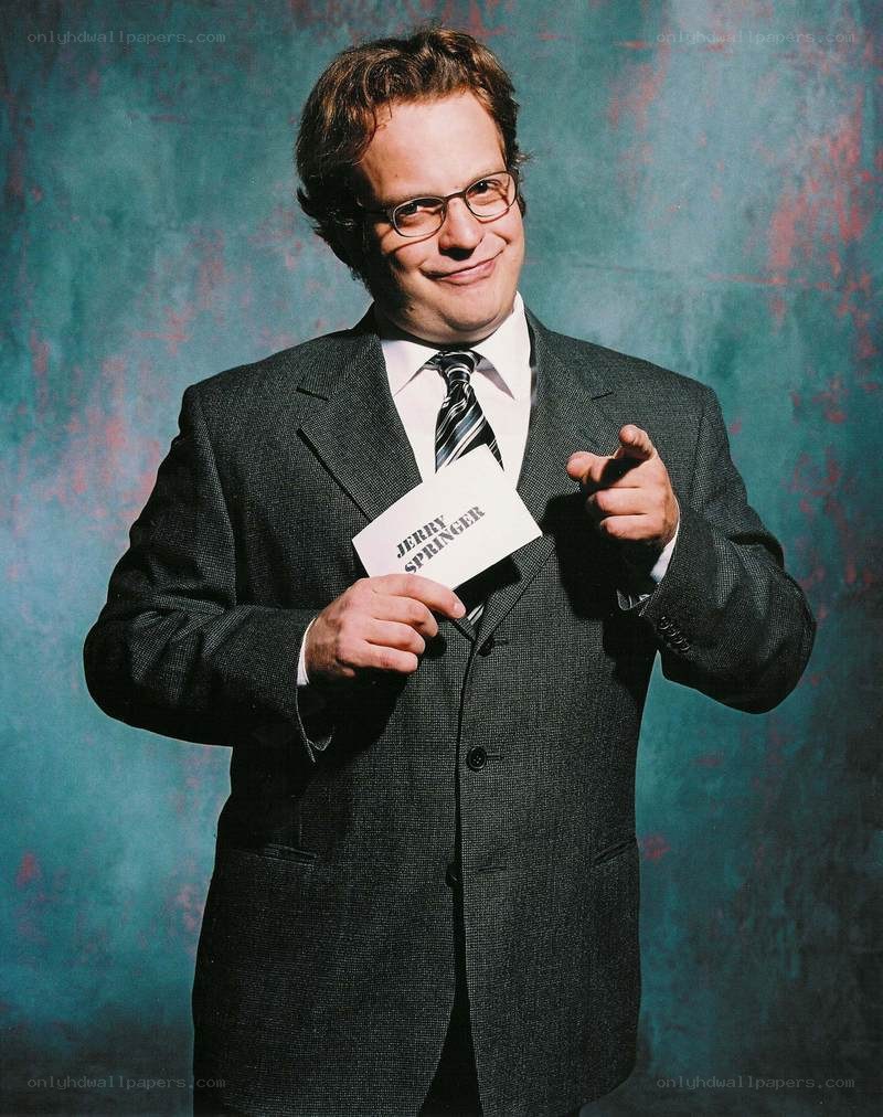 Jerry Springer holding card