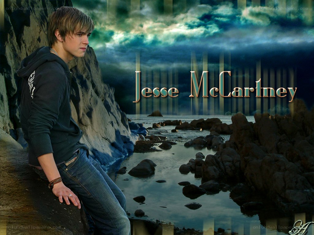 Jesse McCartney on a rocky shore