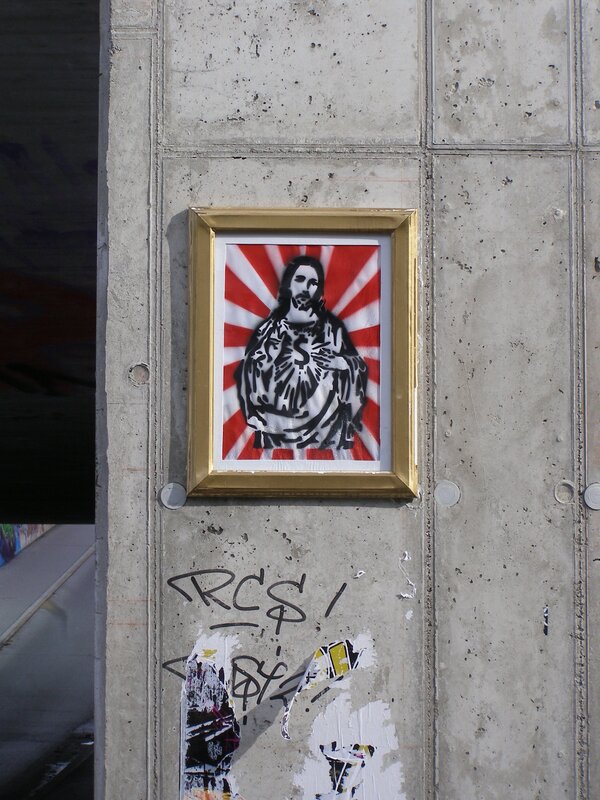 Jesus artwork on concrete wall