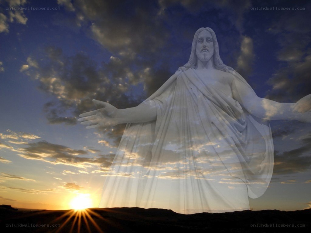 Jesus Christ statue at sunset