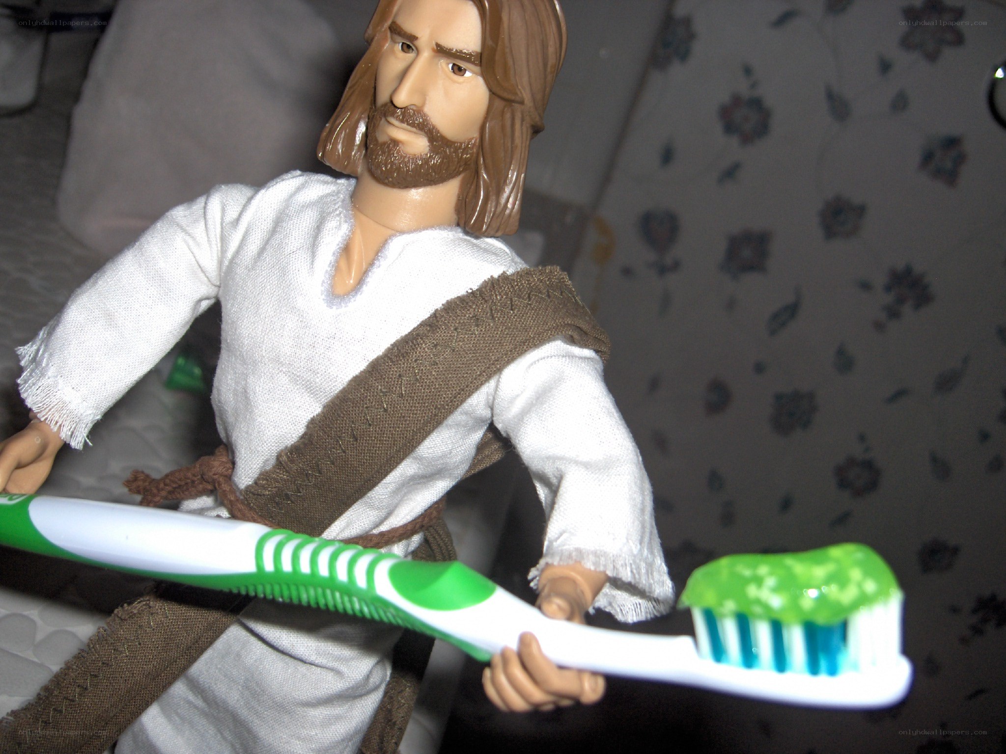 Jesus doll with toothbrush