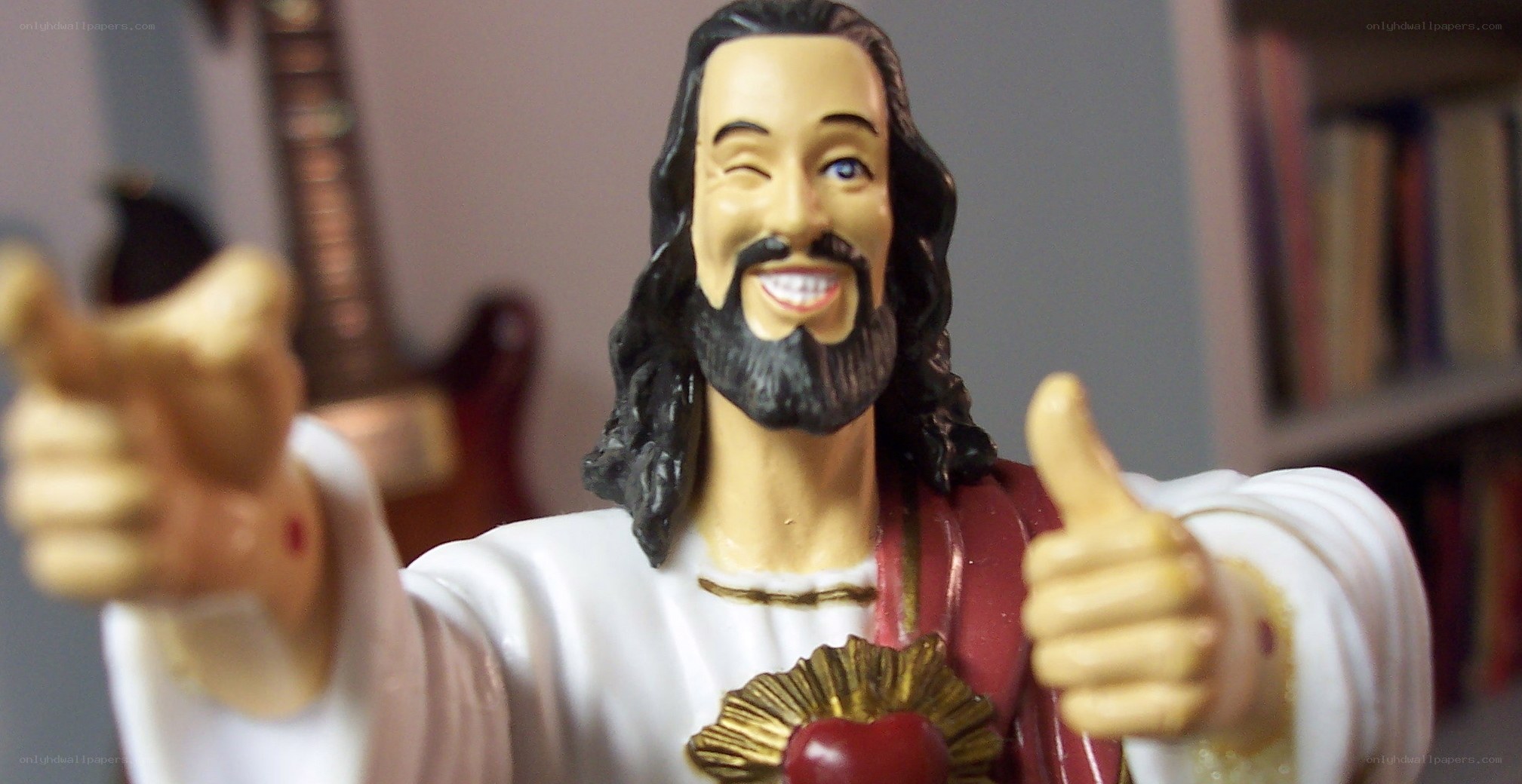 Jesus figurine giving thumbs up