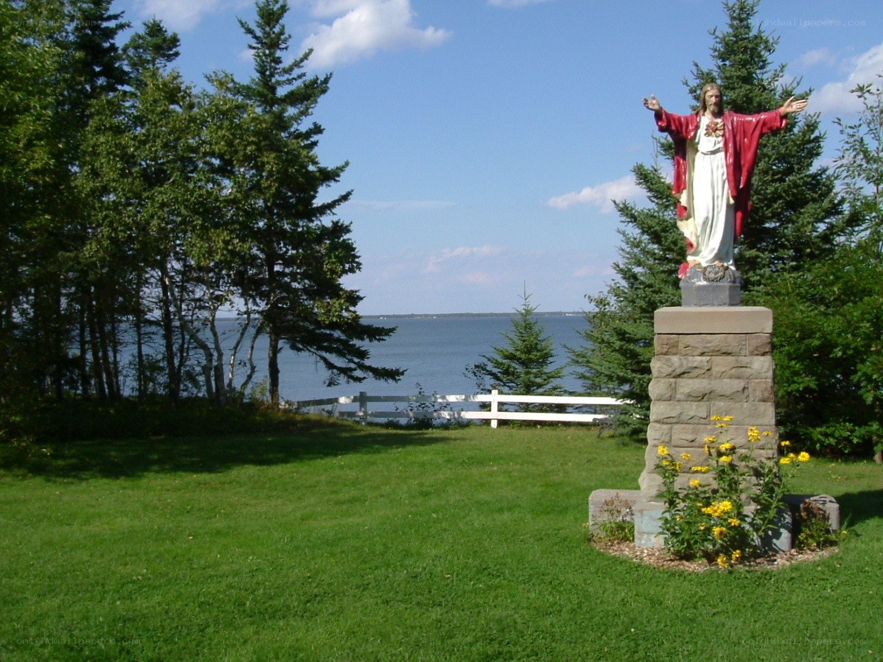 Jesus statue by the water