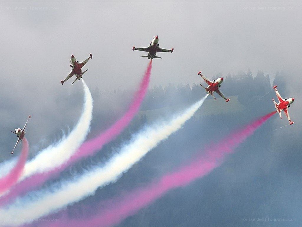 Jet acrobatics with colored smoke
