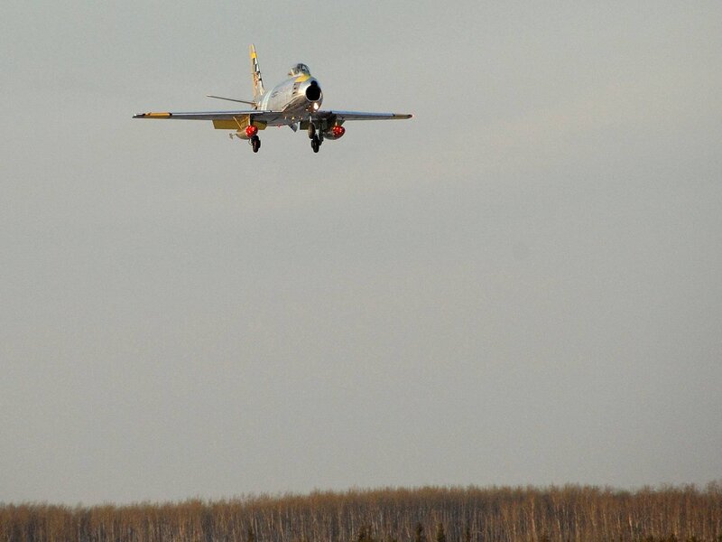 Jet Aircraft in Flight — Gray, Calm