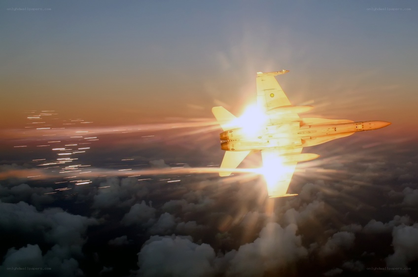 Jet fighter at sunset