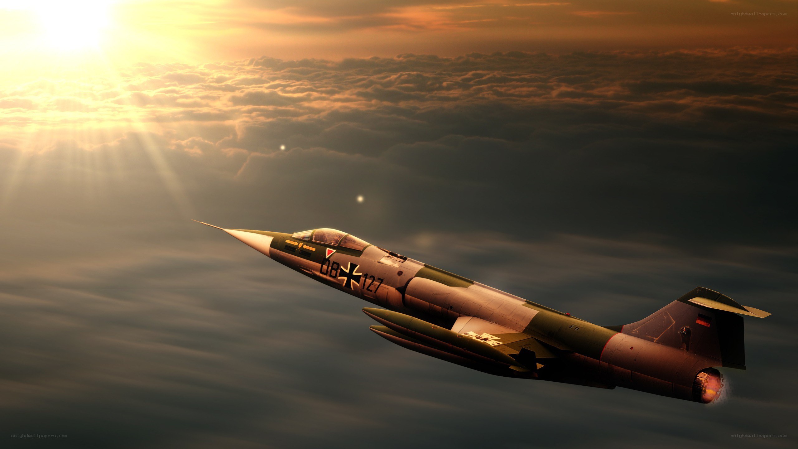 Jet fighter at sunset