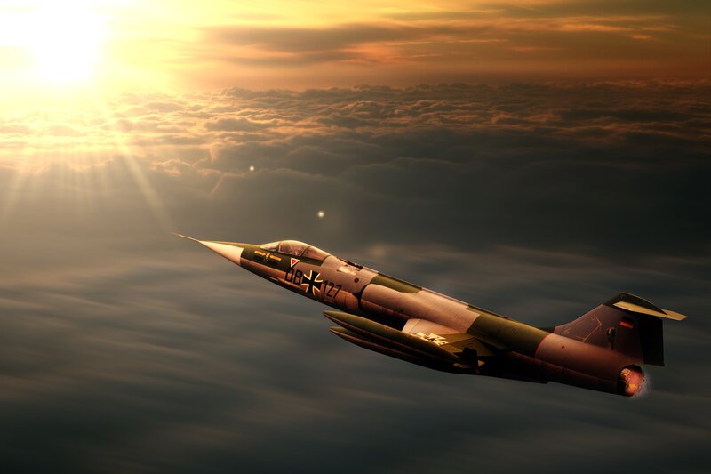 Jet fighter at sunset