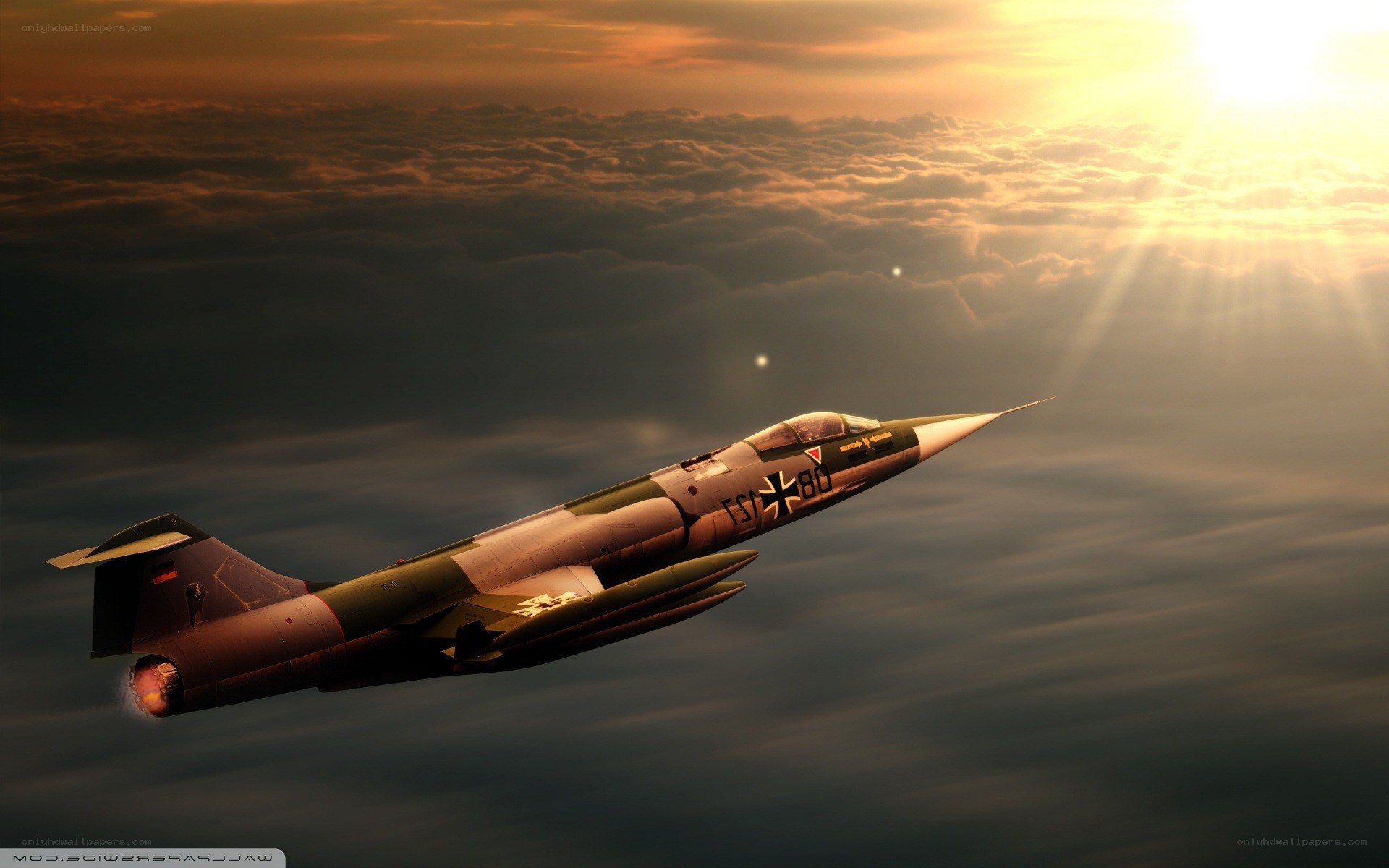 Jet fighter at sunset