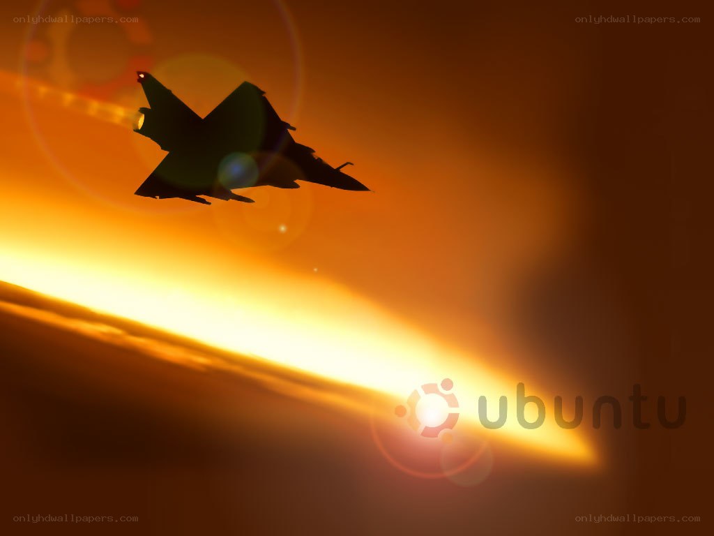 Jet fighter at sunset