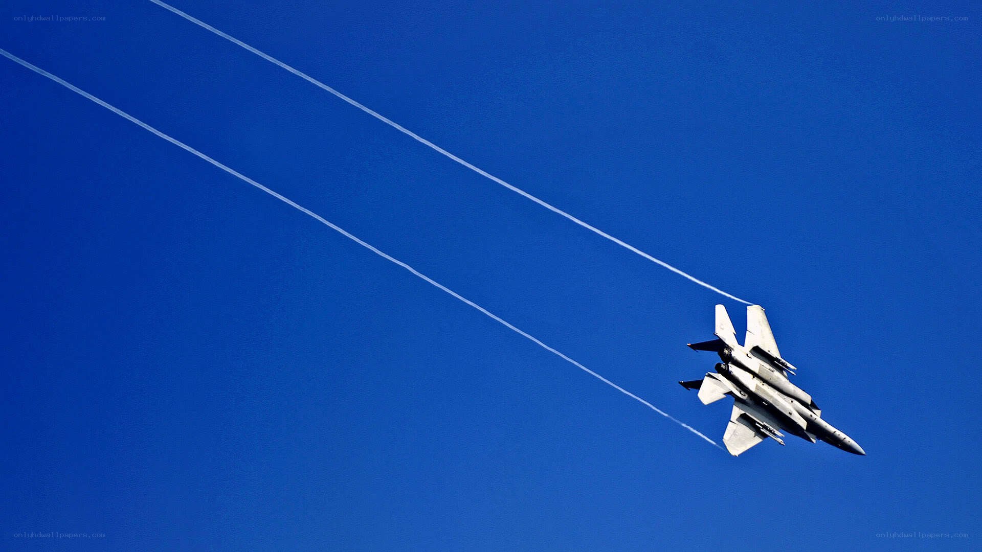 Jet fighter in blue sky
