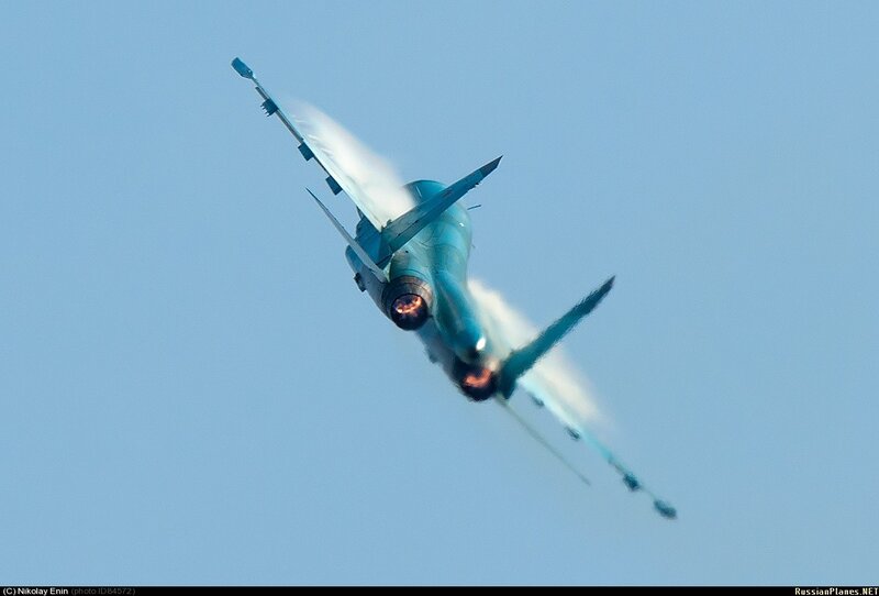 Jet Fighter in Flight — Blue, Dynamic, Afternoon