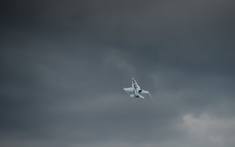 Jet Fighter in Flight — Gray, Dramatic, Photograph, Aircraft, Clouds