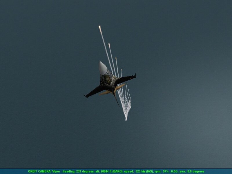Jet fighter in flight with flares
