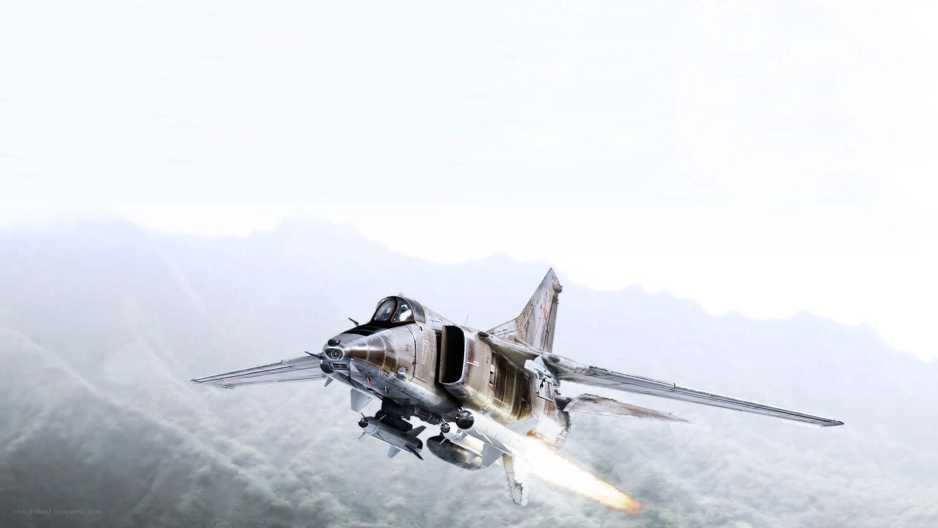 Jet fighter in mountainous flight