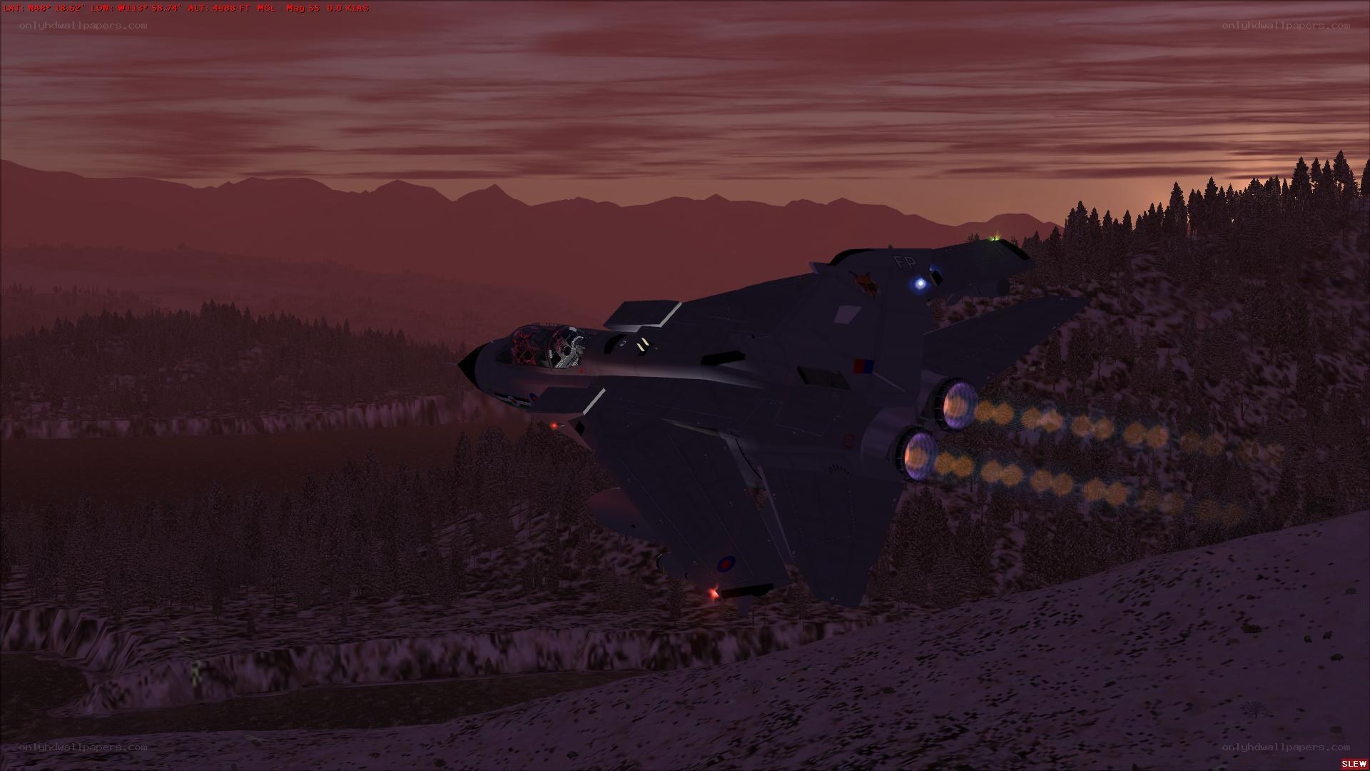 jet fighter in mountainous terrain