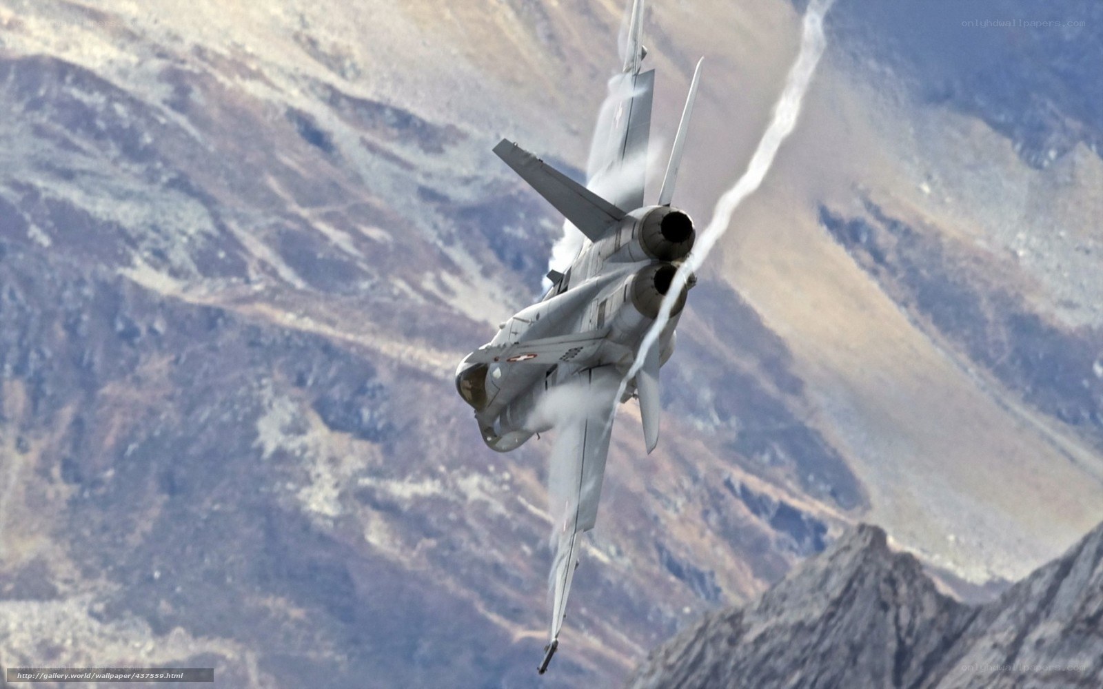 Jet fighter in mountainous terrain