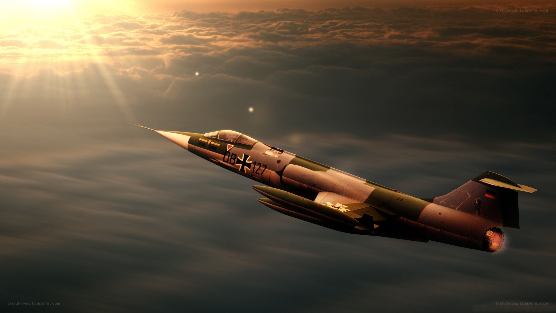 Jet fighter in sunset sky