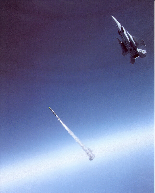 Jet fighter launching missile